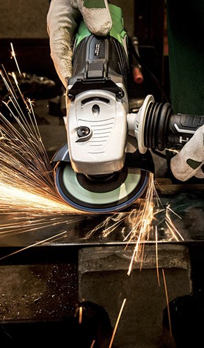 Engineering specialists utilizing advanced design software to develop solutions for complex manufacturing projects.