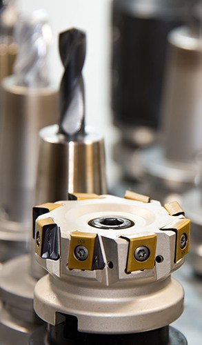 Engineering team collaborating on complex product design and development for customized solutions.