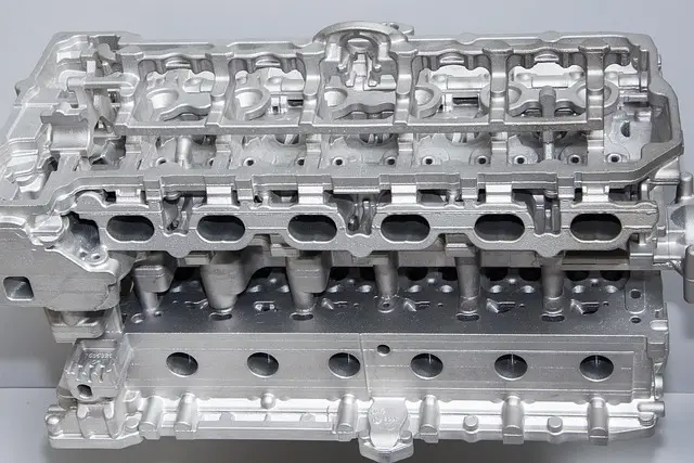 Mold Manufacturing Complex aluminum die casting mold design for 6-cylinder automotive engine head at Sureton.