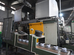 Home High-pressure die casting machine in operation at Sureton's manufacturing facility.