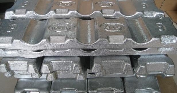 Quality Inspection Stacked zinc alloy ingots (Zamak) raw material for high-precision die casting and CNC machining at Sureton factory.